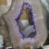Uruguay Minerals. Marcos Lorenzelli S.R.L. Amethyst Geodes Slices with Wood Bases